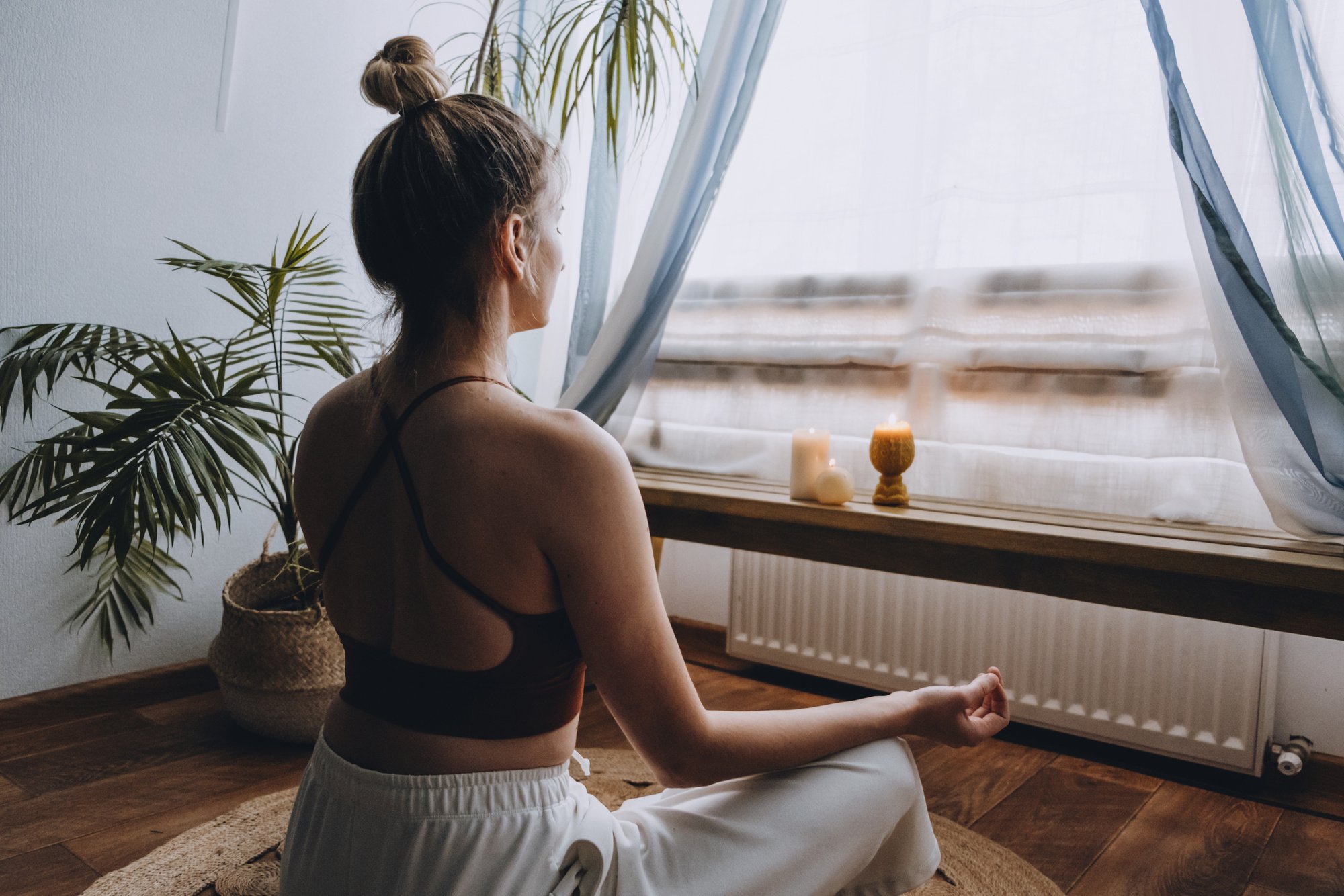 Close Up of Woman Meditating Indoors