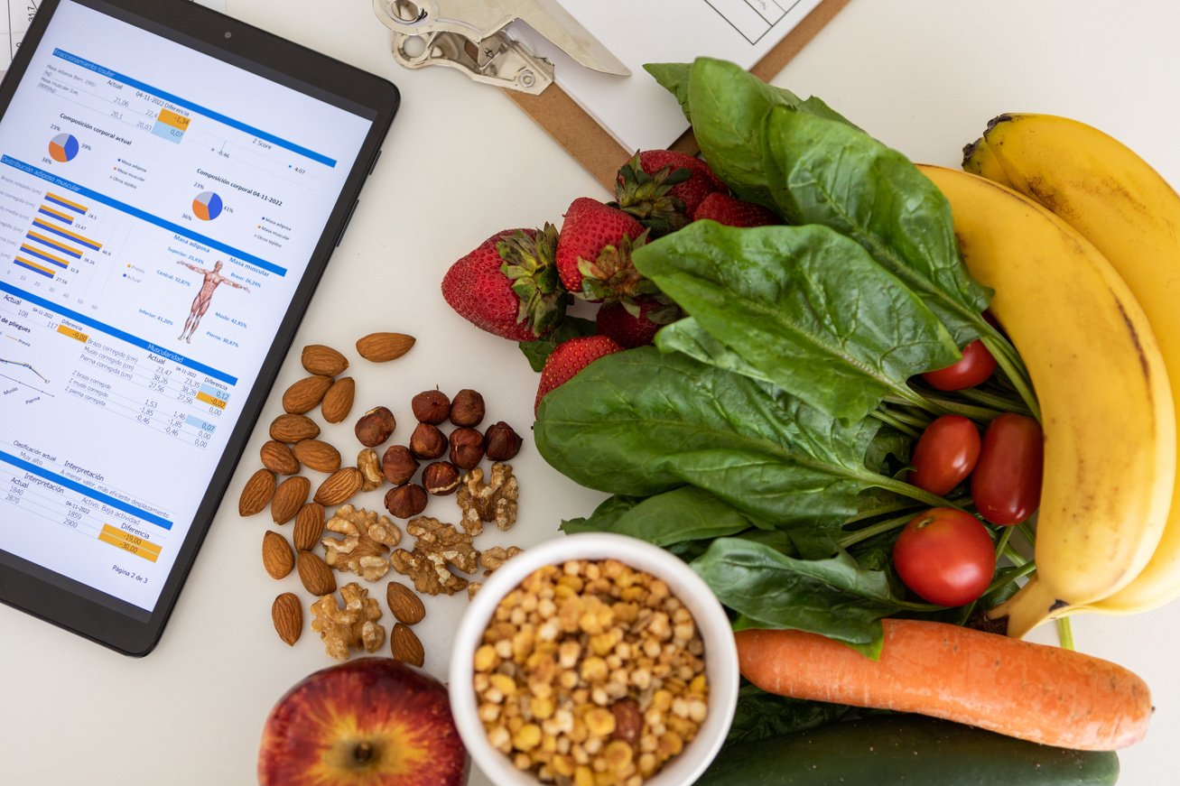 Digital nutritional program with heathy food and digital tablet charts